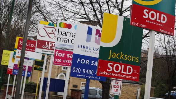 Property for sale signs. Getty Images