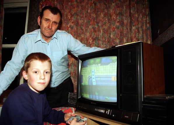 Martyn Rodgers with his Grandfather Tony  of Shirecliffe   Road and the Playstation Game  "Grand theft Auto" in 1998