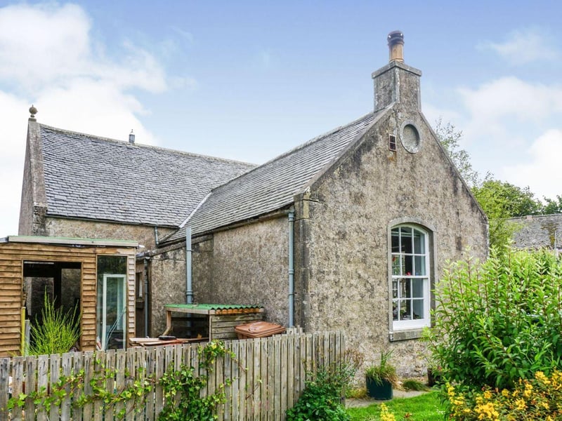 This two bedroom bungalow in Fochabers is on the market for offers over £150,000. As a former church hall it is a listed building with lots character and huge renovation potential.