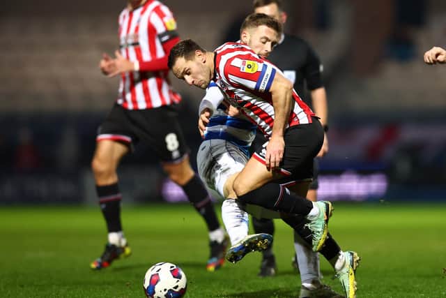 Billy Sharp of Sheffield United tries to battle through the QPR defence: David Klein / Sportimage