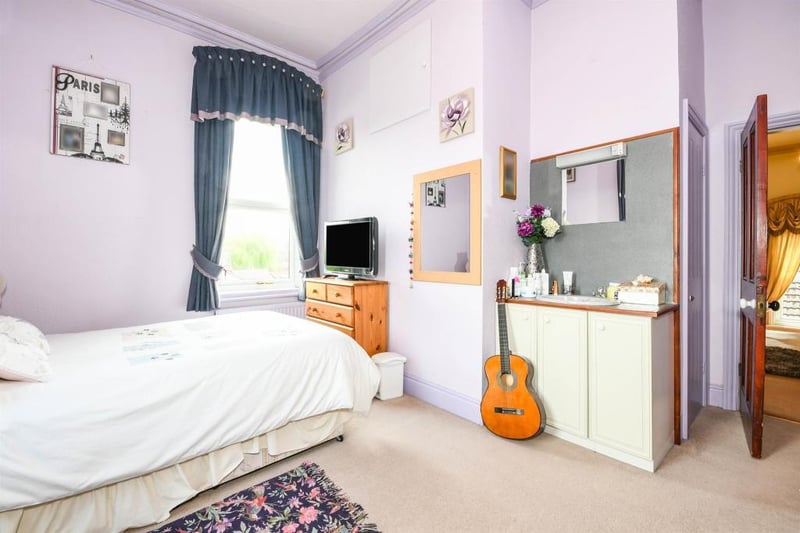 Bedroom three, on the first floor, is a dual aspect bedroom which is fitted with coving to ceiling, a central heating radiator and PVCu double glazed windows to the front and side, while there is also a hand basin.