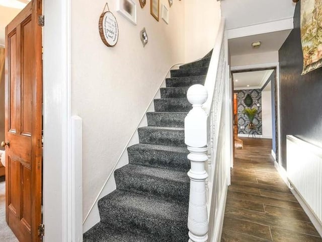 Leading the way upstairs is this welcoming entrance hall. Fitted with tiled flooring, it is neat and stylish.
