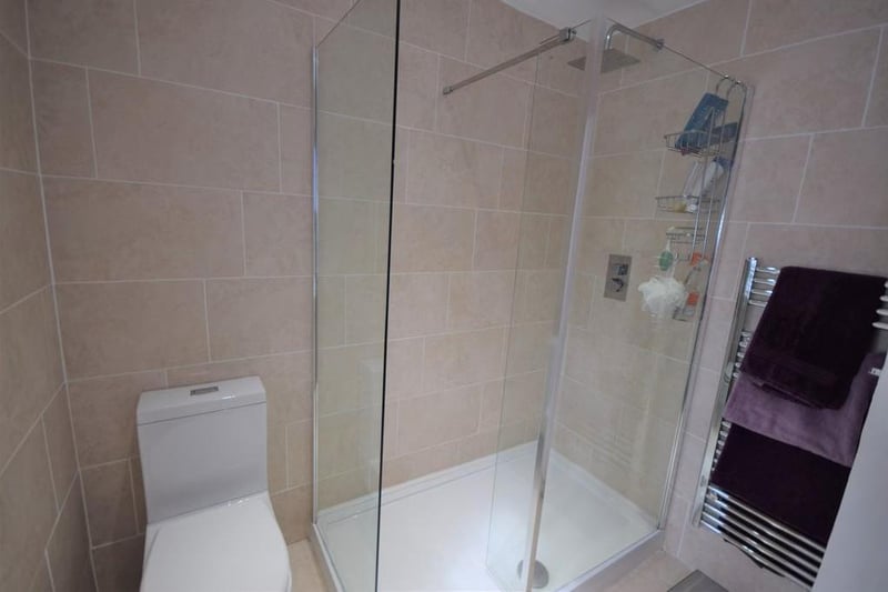 A beautifully refurbished ensuite shower room that combines a modern twist to this cottage. Having a shower cubicle, w.c., wash basin, extractor fan, heated towel rail and a wall mounted illuminated mirror.