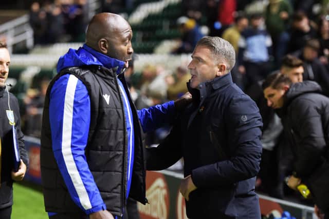 Sheffield Wednesday boss Darren Moore with Plymouth Argyle manager Ryan Lowe   Pic Steve Ellis