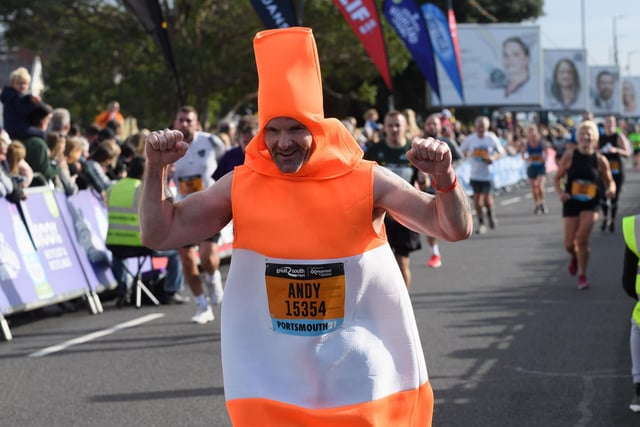 Andy Card, the traffic cone completes the 10-mile race. Picture: Keith Woodland (171021-0)