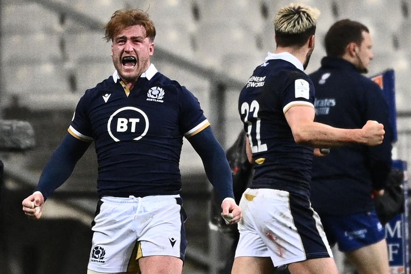 Stuart Hogg celebrates after Scotland scored the winning try at the end of the Six Nations rugby union tournament match between his side and the French at the Stade de France in Saint-Denis, outside Paris (Photo by Anne-Christine Poujoulat/AFP via Getty Images)