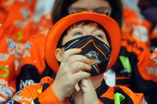 Sheffield Steelers fan wearing a mask to watch their team at Cardiff. Picture: David Williams
