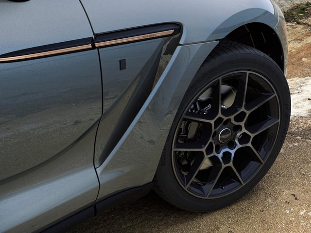 The cars are finished in Xenon Grey or Bowmore Blue and copper side strakes made with copper from the original Bowmore stills are a striking detail.