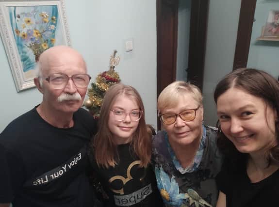 Olena Mandrik with her parents and daughter in Kyiv, the capital of Ukraine, a year ago.