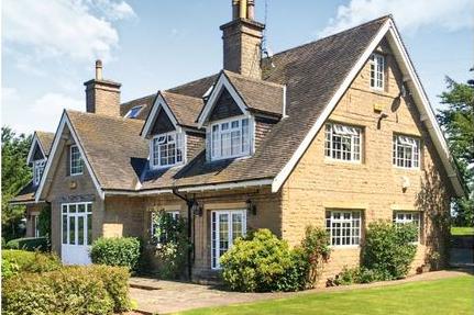 This seven bedroom house has countryside views, annexe and an outdoor swimming pool.