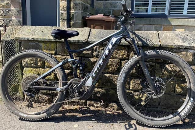 An electric bike was stolen from a man who was cycling through Wharnclifffe Woods near Oughtibridge.
