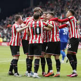 Sheffield United's Ciaran Clark (centre) celebrates scoring their side's fourth goal of the game during the Sky Bet Championship match at Bramall Lane, Sheffield: Richard Sellers/PA Wire.
