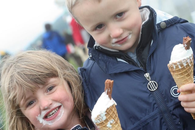 Maddison Boswell, three, and Charlie Bale five, from Chesterfield enjoying ice-creams despite the rain in 2006