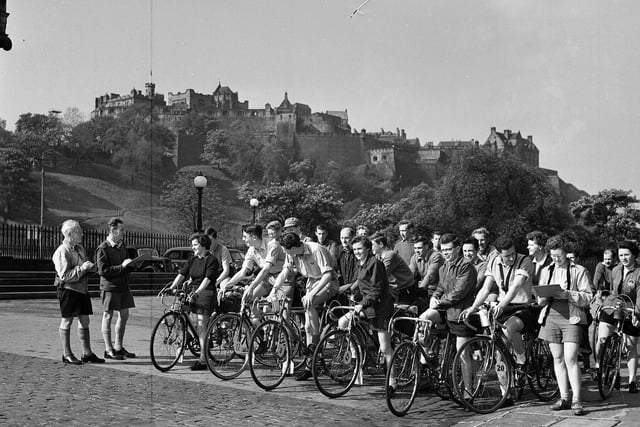A Cycling Touring Club leaving the Mound, watched by a starter and timekeeper, in June 1958.