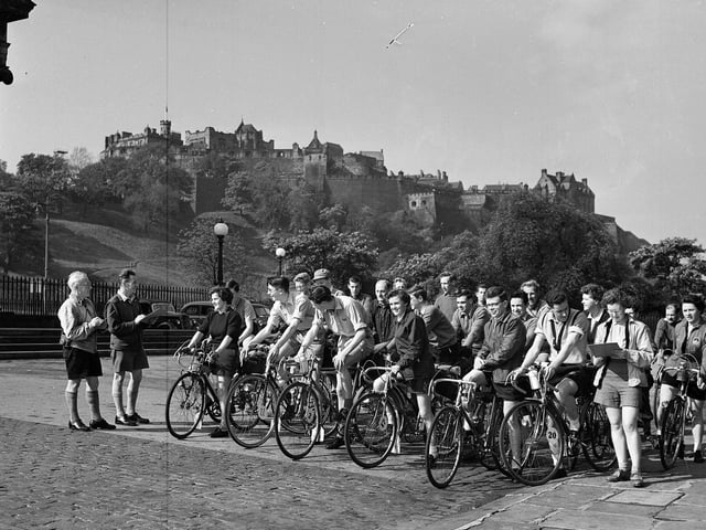 A Cycling Touring Club leaving the Mound, watched by a starter and timekeeper, in June 1958.
