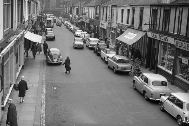 We've spotted a Mini, VW, and Hillman in this 1961 view of Blandford Street but how many other vehicles do you recognise?
