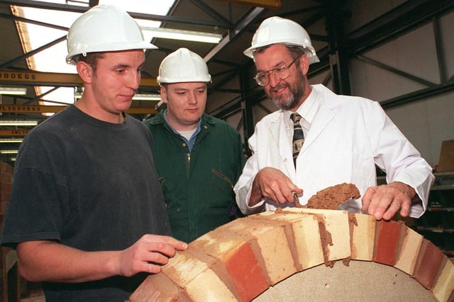 John Battle MP,  tried his hand at bricklaying at the new construction centre at  Sheffield College, Castle centre, in 1998 with students, left,Stephen Phillips (20) and right, Darren Barnsdale (28).
