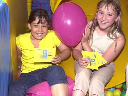 Laura Walker and Charlotte D'Rozario in a fun bus in 2001 as part of the Summer Fun Campaign.