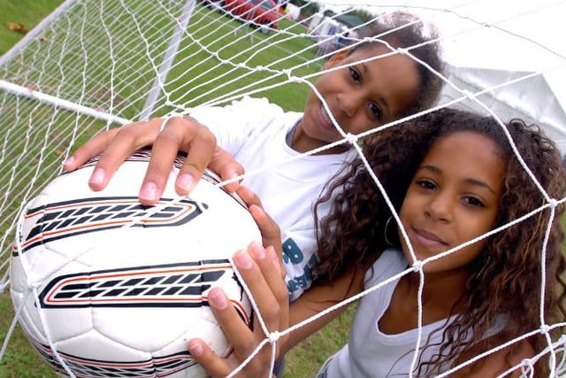 Juliana and Helena Kouamo, aged 12. Playing football in 2006.