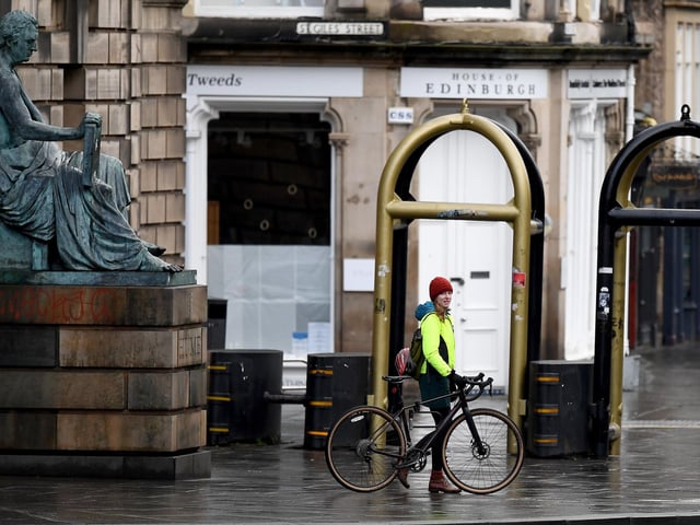 Cyclist in Edinburgh City Centre on January 4, 2021 in Edinburgh, Scotland.