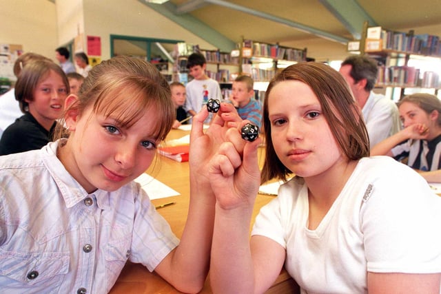 Samantha Dye and Kelly Shipley both 11 in 1998 used dice in a numeracy game at the Summer School at Yewlands School