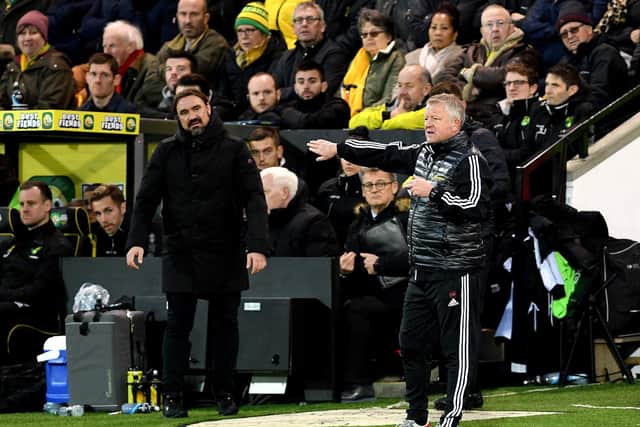 Sheffield United manager Chris Wilder (centre) and Norwich City manager Daniel Farke (left) on the touchline during the Premier League match at Carrow Road, Norwich: Joe Giddens/PA Wire.