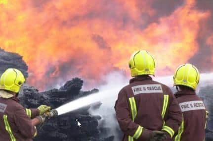 A man has been arrested and released after a suspected arson attack on Hatfield House Lane , near Firth Park, in Sheffield. File picture shows South Yorkshire firefighters