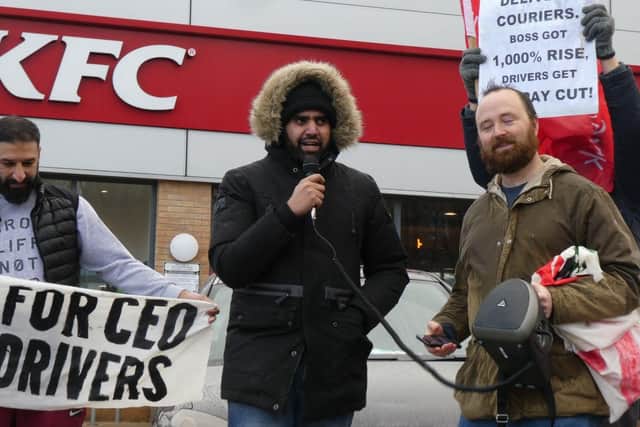 Couriers blocked a KFC drive-through on Queens Road, set off smoke canisters, hooted car horns and chanted ‘Just Eat, Stuart, you can’t hide, we can see your dirty side!’ while waving banners demanding a pay rise.