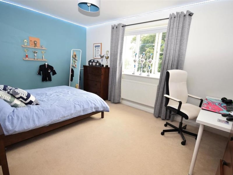 Another comfortable bedroom. It is substantially sized, compete with radiator and uPVC window to the rear.