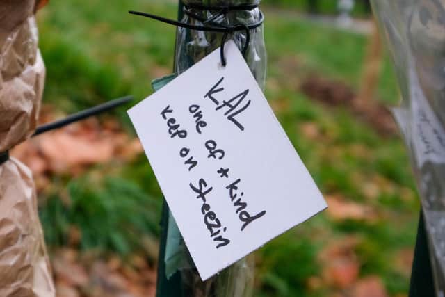 Friends left tributes at the site of the fatal crash in December 2021.