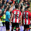 RED CARD: Sheffield United's Mason Holgate is sent off against Brighton and Hove Albion