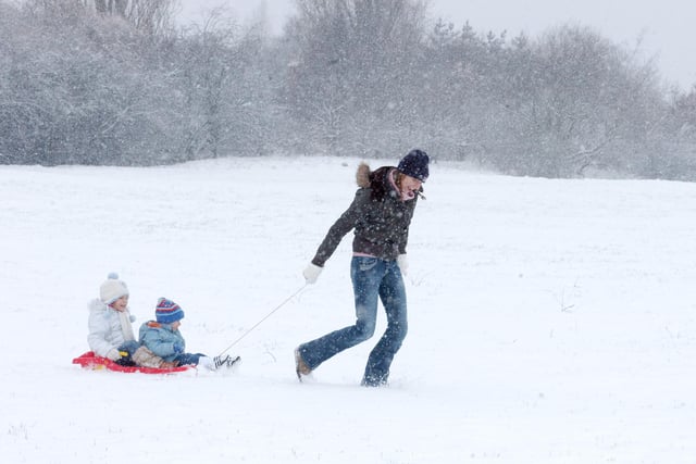 Do you recognise this family having fun in the snow?