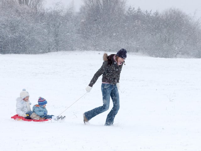 Do you recognise this family having fun in the snow?