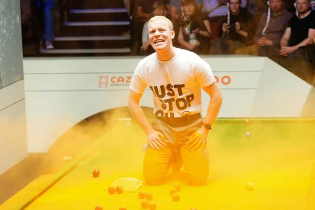 An audience member at The Crucible during the World Snooker Championship has described how a protest by Just Stop Oil happened "in slow motion". Mike Egerton/PA Wire.