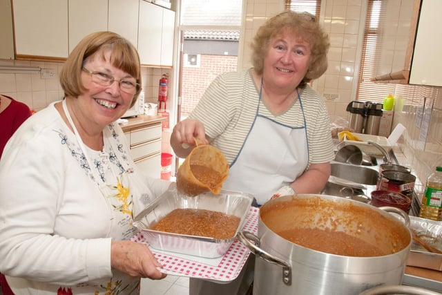 Margaret Jackson (left) and Barbara Cash prepared another pie for the Queens Jubilee Big Lunch in 2012
