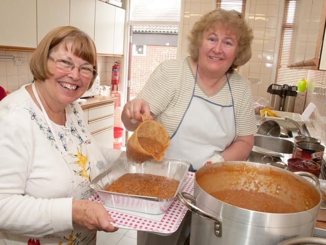Margaret Jackson (left) and Barbara Cash prepared another pie for the Queens Jubilee Big Lunch in 2012