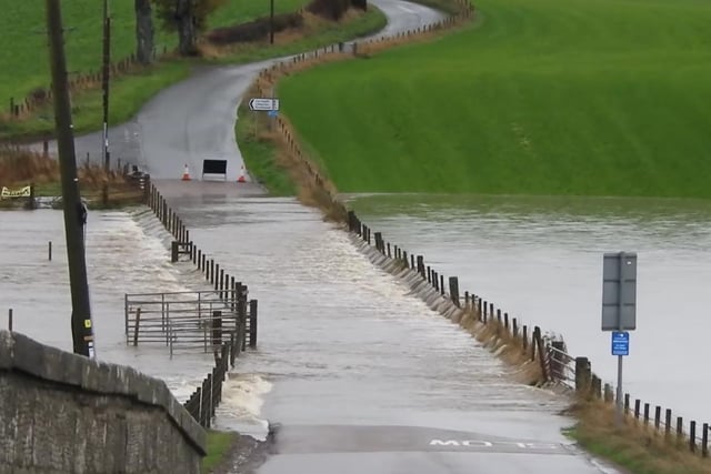 Covington Road near Thankerton in South Lanarkshire was completed block after overnight flooding.