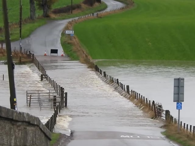 Covington Road near Thankerton in South Lanarkshire was completed block after overnight flooding.