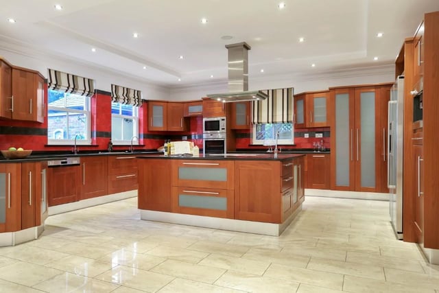 Whether it be for entertaining or enjoying family breakfast, this stylish dining kitchen is at the heart of the home. There is a wealth of base and wall units, plenty of worktop space and a central island that houses a double-width oven and six-point electric induction hob with extractor over.