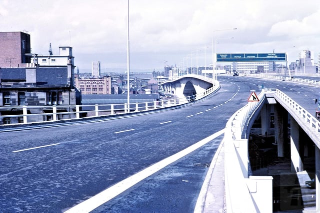 The Kingston Bridge is 270m long, over 40m wide and crosses the River Clyde at a maximum height of almost 20m.