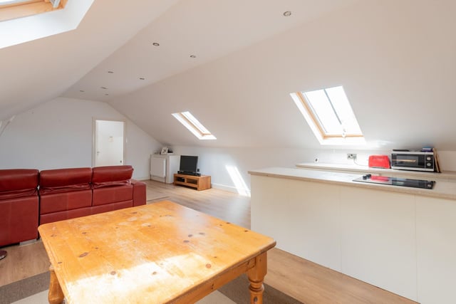 Situated on the second floor, the new owner of this property could turn this section of the building into it's own flat as the space as a kitchen area, lounge and a bathroom just before the entrance.
