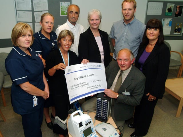 The Daffodil Voluntary Services raised over £60,000 to purchase new equipment for the Kings Treatment Centre from the Daffodil Cafe, Dukeries Tea Bar and ward trolley service. Ron Tansley, right Chairman of the Daffodil Voluntary Services presented the equipment in 2009 to Tracy Doucet, second left ,Chairman of the Sherwood Forst Hospitals watched from the left by; Pam Squires ward 23, Mandy Toplis Department Leader Kings Treatment Centre, John Deeming Daffodil Cafe leader, Diane Kerry Dukeries Tea Bar Leader, James Harriosn Chief Audiologist and Michele Platt Nurse Consultant Critical Care.