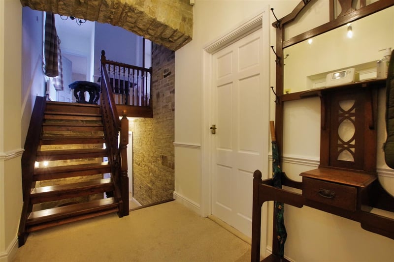 The hallway provides access to the cellar.