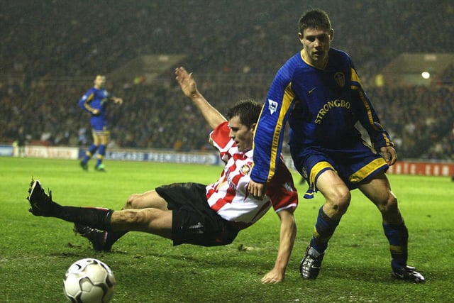 James Milner of Leeds clashes with Kevin Kilbane of Sunderland during the Premier League match at the Stadium of Light on December 26, 2002.