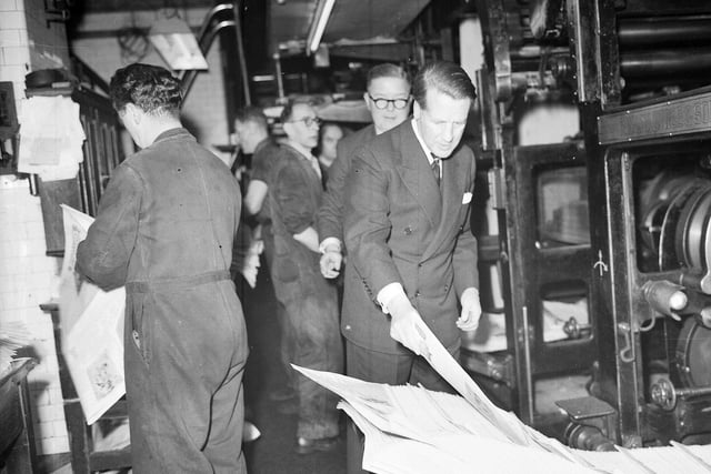 The Duke of Hamilton picks out one of the first souvenir copies of The Scotsman to be printed in April 1957.