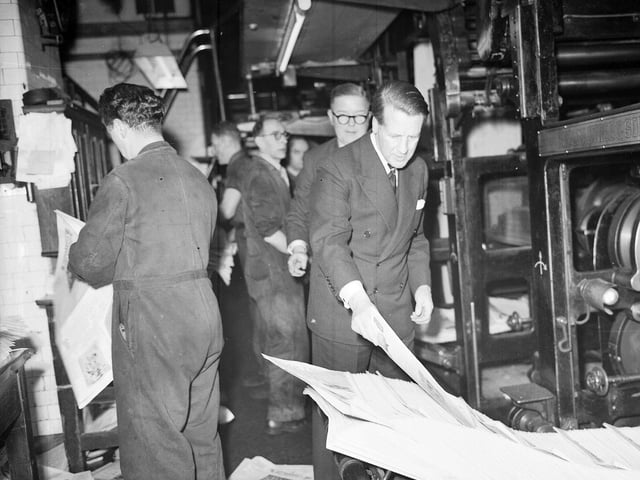 The Duke of Hamilton picks out one of the first souvenir copies of The Scotsman to be printed in April 1957.