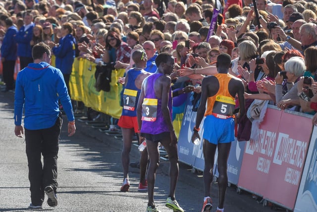 The first three finishers in the 2015 Great North Run, including Mo Farah, were pictured with the crowds near the finish line. Can you spot someone you know?
