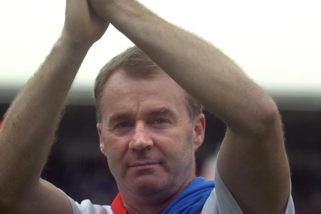 Sheridan claps the fans after being crowned champions against Gillingham.