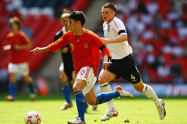 Daniel Lobato (L) of Spain holds off Oliver Norwood (R) of England during the International Friendly match between England Under 16s and Spain Under 16s at Wembley Stadium