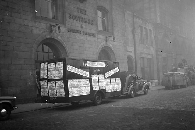 The Evening News delivery van, plastered with posters advertising Housewives Demonstrations, outside the newspaper offices in September 1959.
